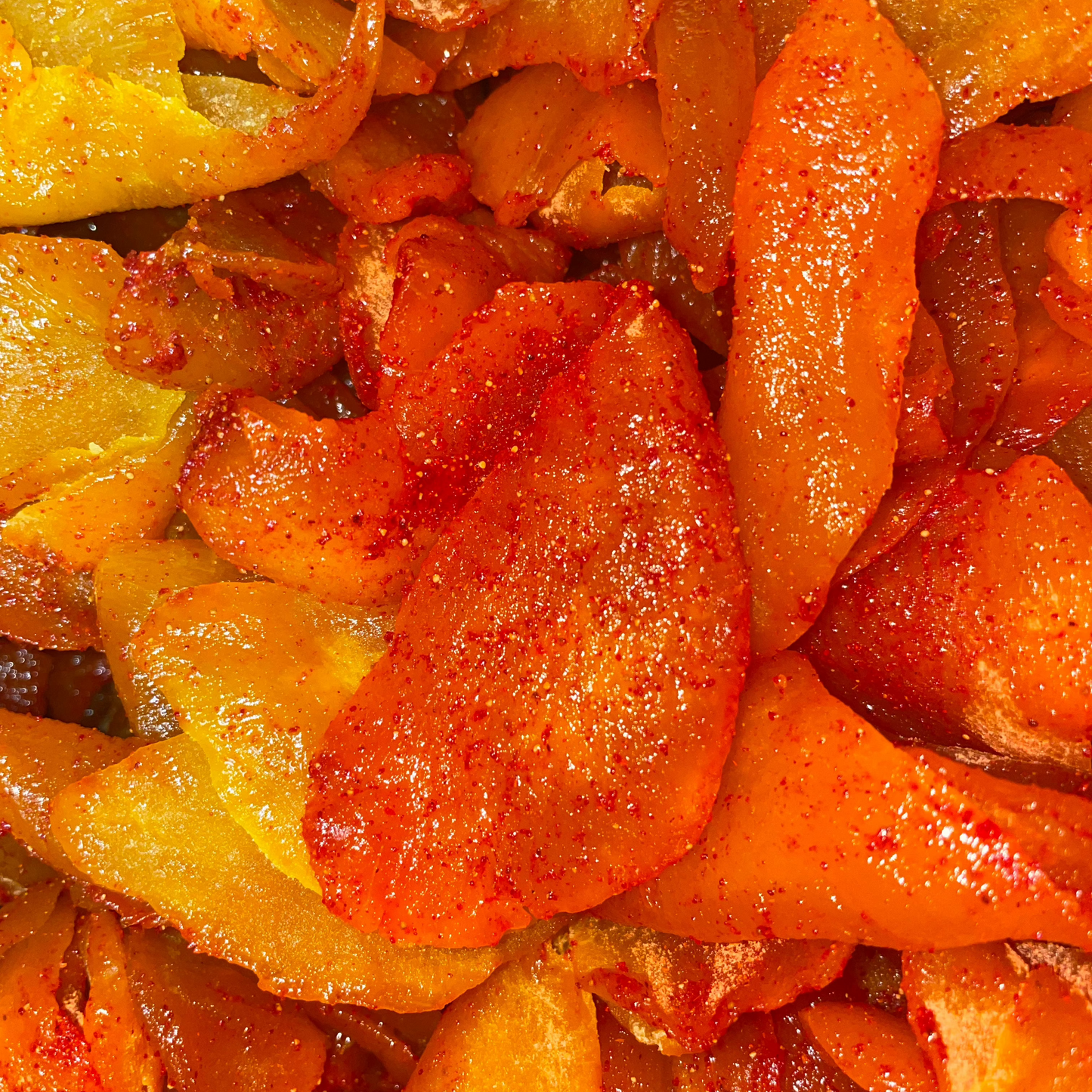 Close-up of dried orange and yellow fruit slices.
